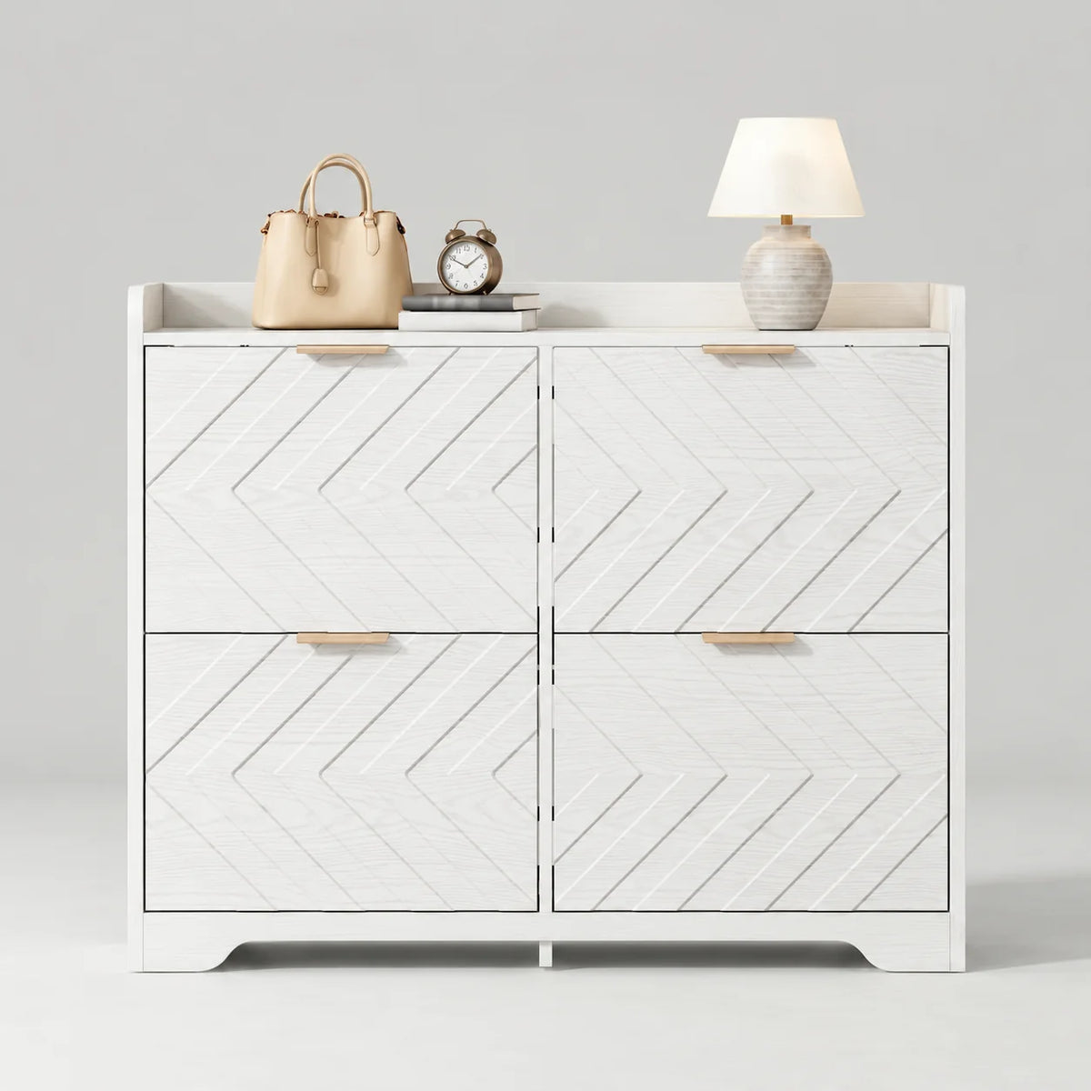 Meuble à chaussures blanc à quatre compartiments abattants et façades à chevrons sur fond gris