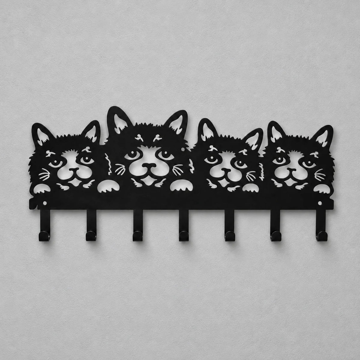Porte-manteau mural noir à quatre visages de chats et sept crochets sur fond gris Image