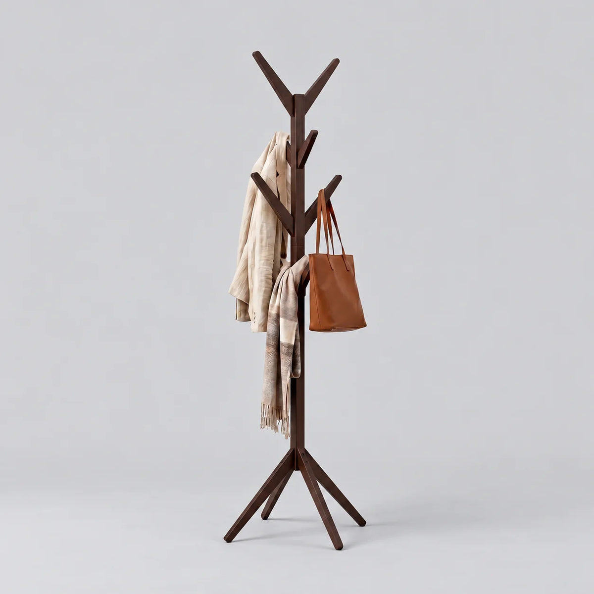 Porte-manteau arbre sur pied à huit crochets en bois foncé, sur fond gris