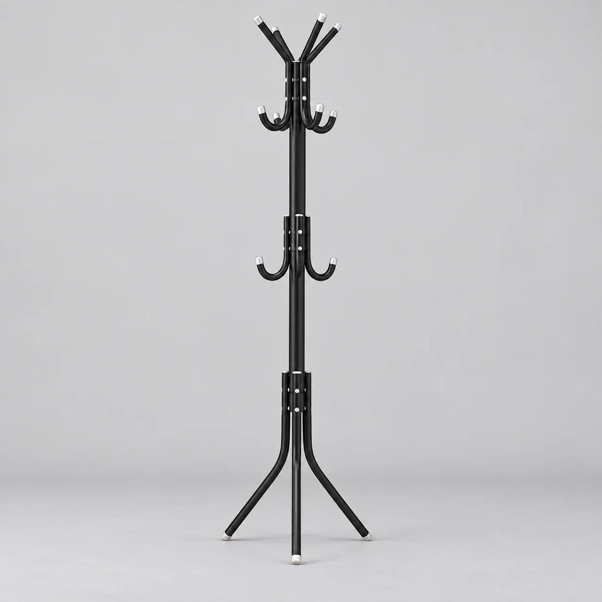 Porte-manteau perroquet noir avec crochets courbés et base à trois pieds sur fond gris Image