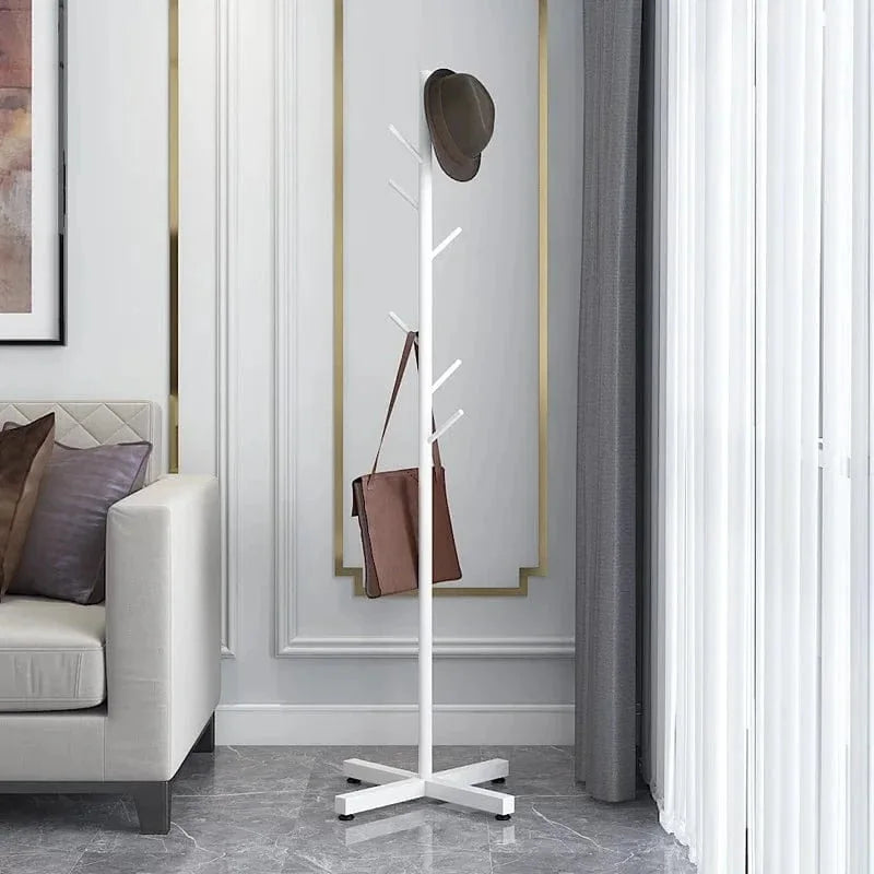 Porte-manteau arbre blanc à base croisée dans un intérieur gris, photo originale Image