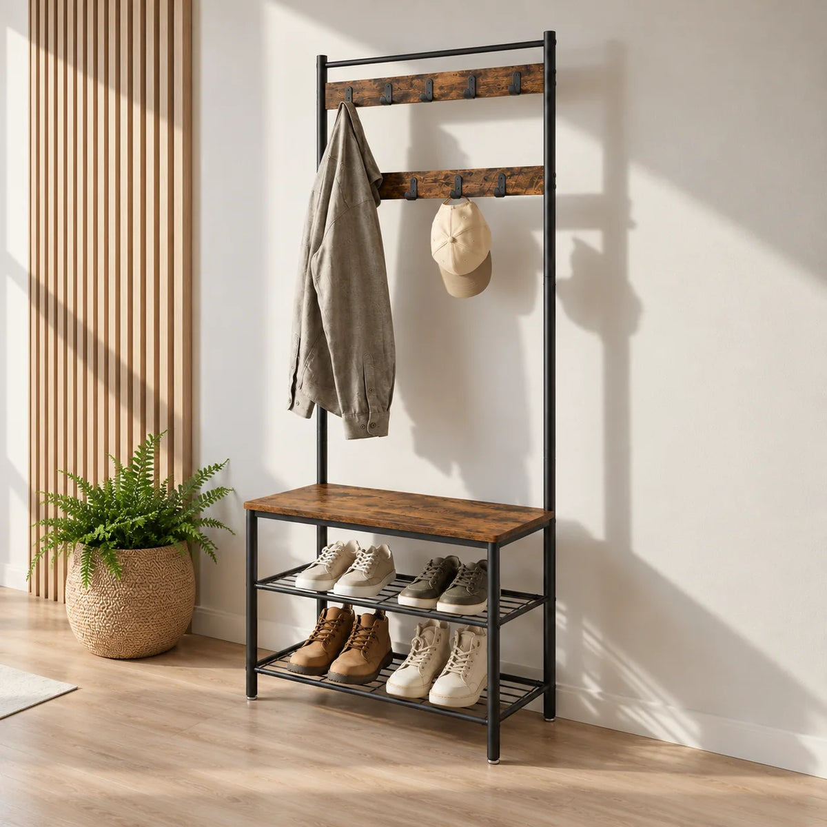 Autre angle du porte-manteau banc noir et bois brun dans une entrée