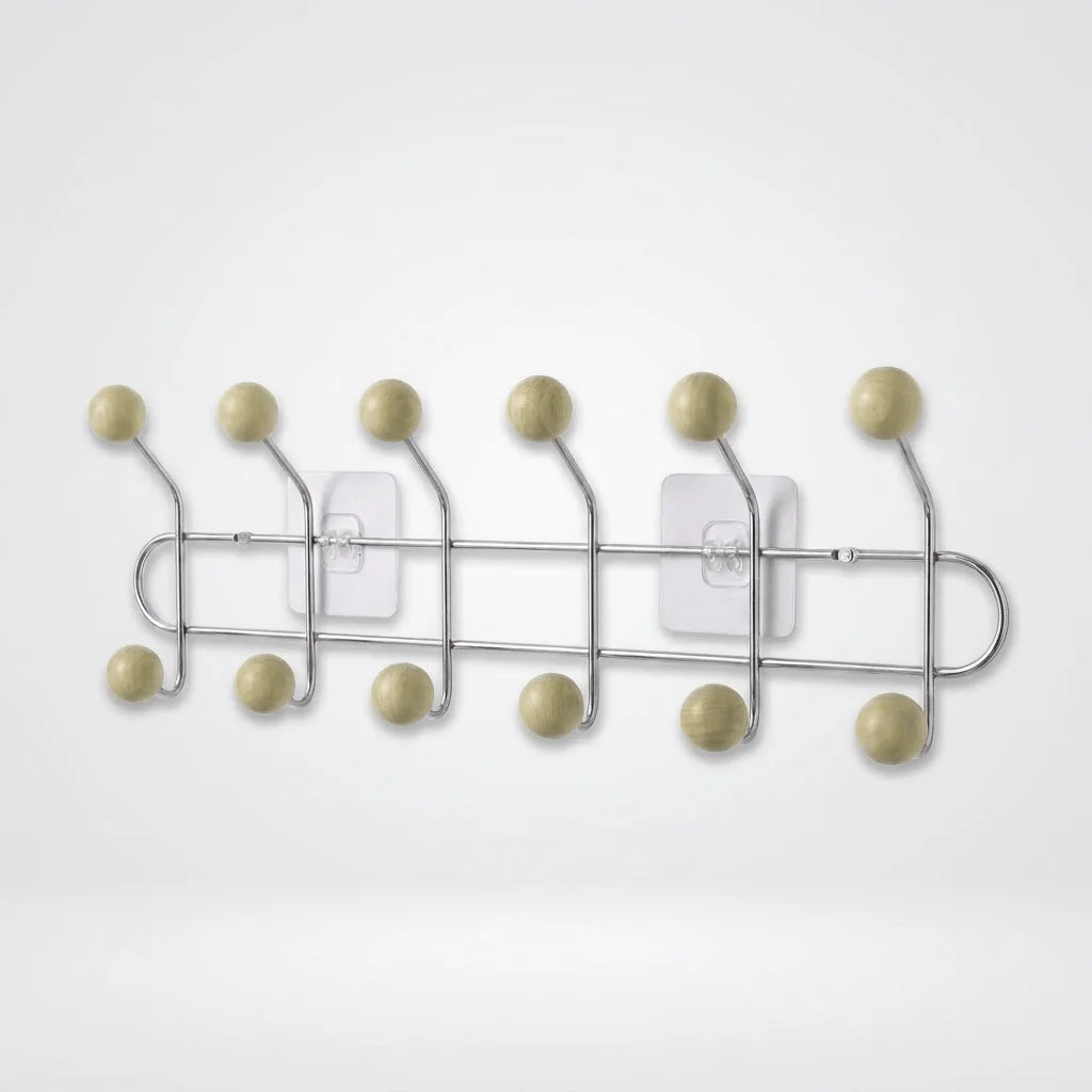 Photo originale du porte-manteau mural chromé à six bras et douze boules bois jaune crème