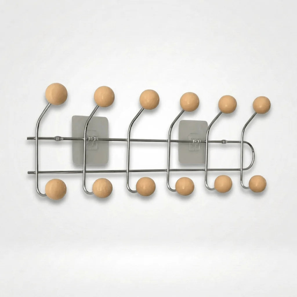 Photo originale du porte-manteau mural chromé à six bras et douze boules abricot