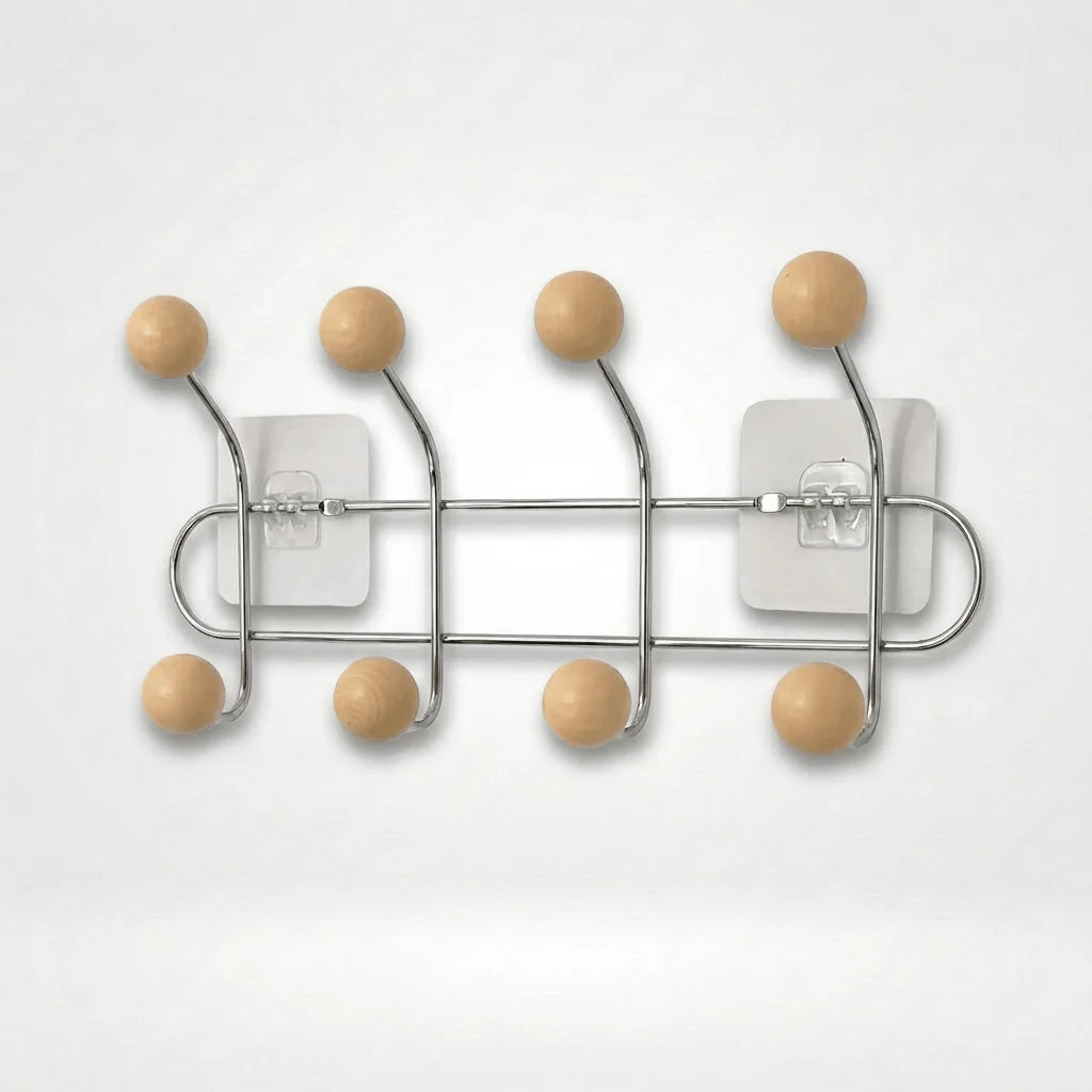 Photo originale du porte-manteau mural chromé à quatre bras et huit boules bois
