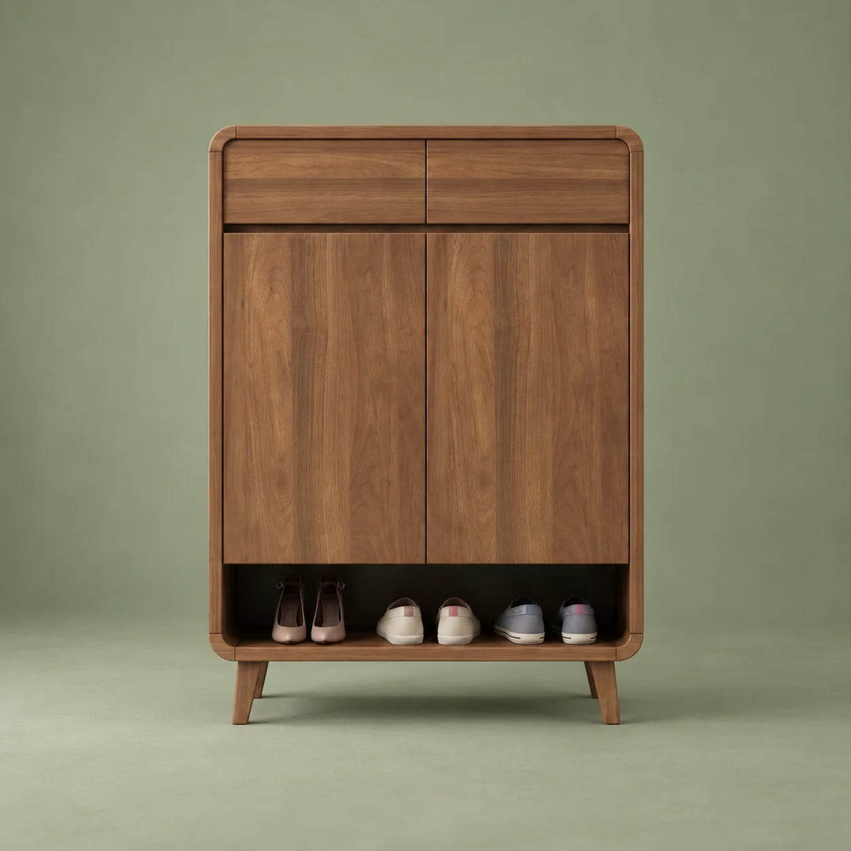 Vue de face du meuble à chaussures marron en bois sur fond vert sauge
