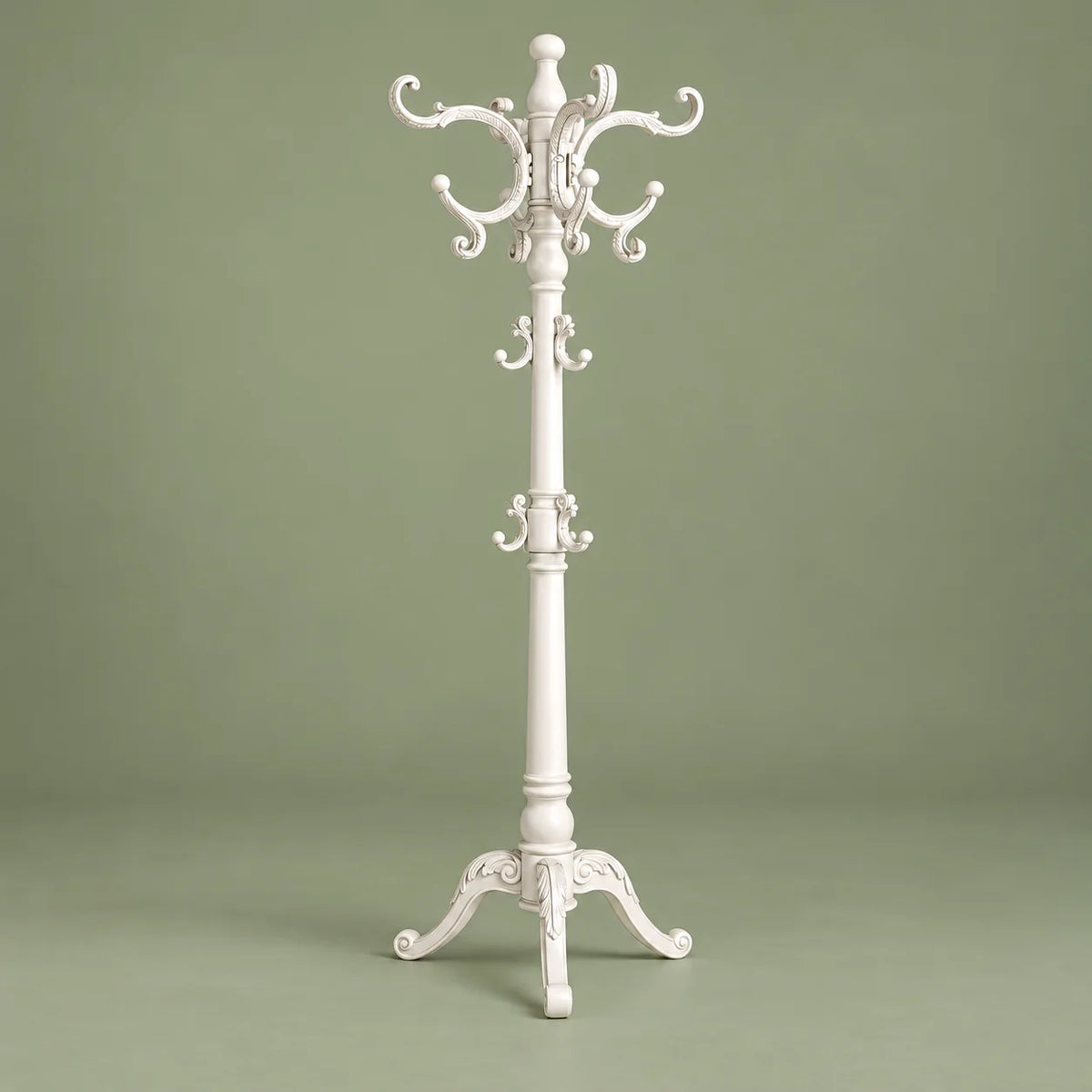 Porte-manteau perroquet blanc vu de face sur fond vert sauge