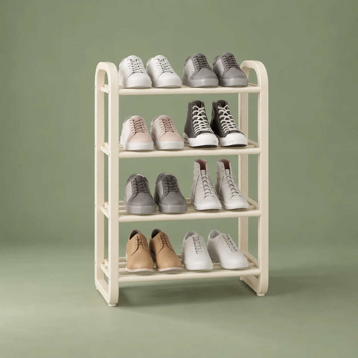Vue de trois quarts gauche de l’étagère à chaussures blanche à quatre niveaux sur fond vert sauge