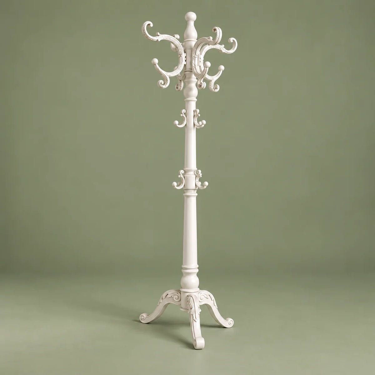 Porte-manteau perroquet blanc vu sous un autre angle sur fond vert sauge