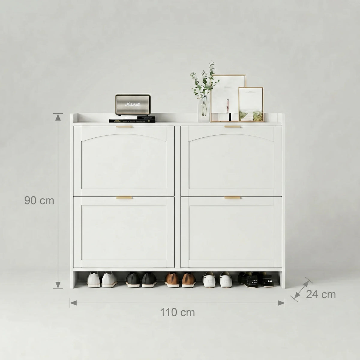 Dimensions du meuble à chaussures blanc : 90 cm de hauteur, 110 cm de largeur et 24 cm de profondeur
