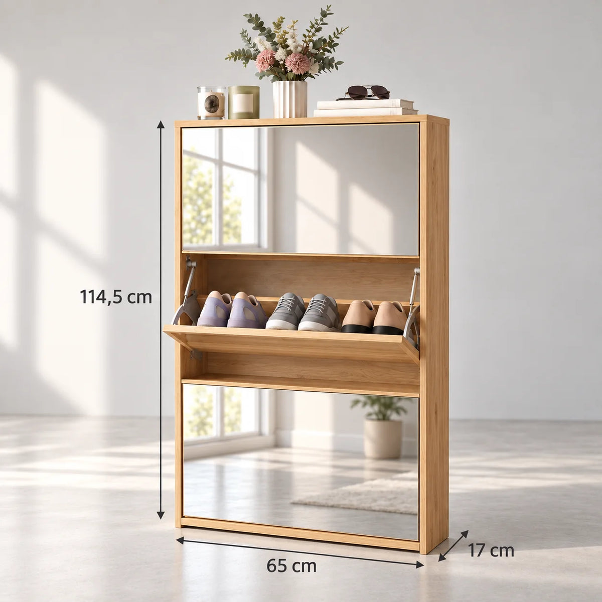 Dimensions du meuble à chaussures en bois clair avec miroirs : 114,5 cm de hauteur, 65 cm de largeur et 17 cm de profondeur