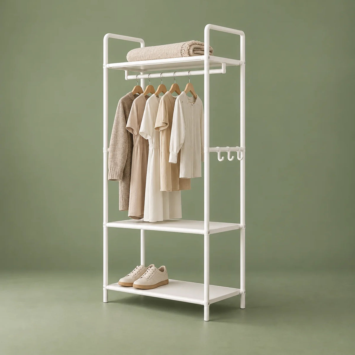 Vue de trois quarts du porte-manteau meuble blanc sans roulettes avec étagères de rangement