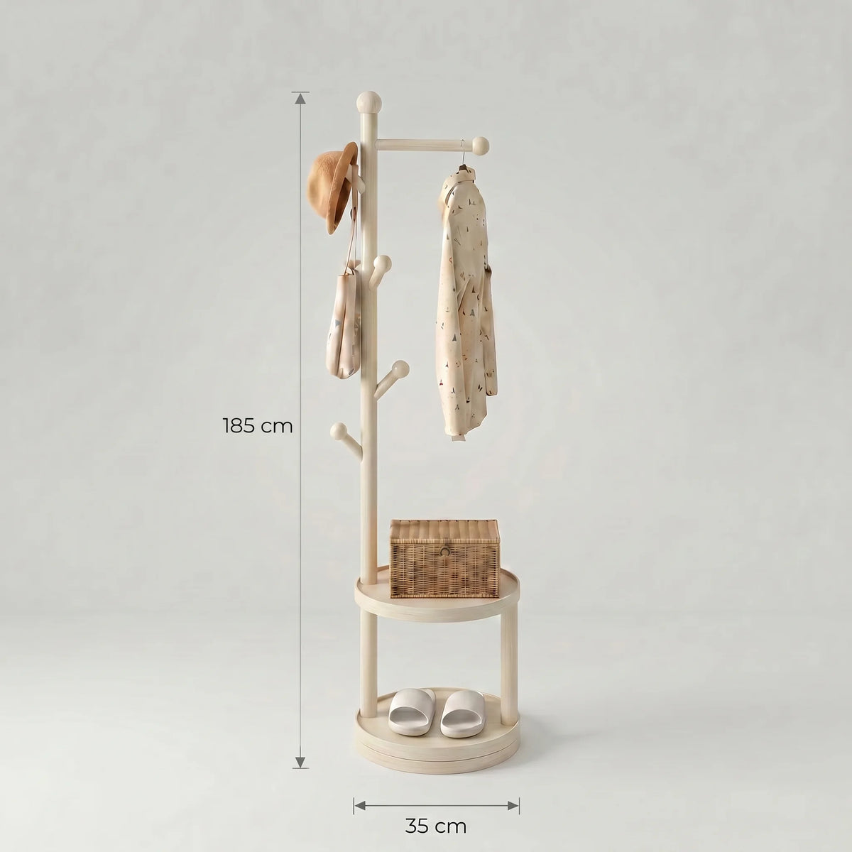 Dimensions figurant sur la photo du porte-manteau en bois blanc : hauteur 185 cm et diamètre de base 35 cm